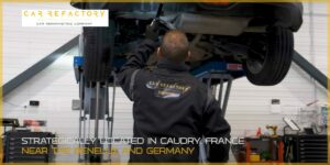 Car Refactory technician performing detailed undercarriage inspection during vehicle refurbishment service