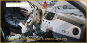 Technician performing interior vehicle refurbishment of Fiat 500 dashboard at Car Refactory facility