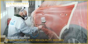Technician performing professional vehicle refurbishment with paint spraying in specialized booth